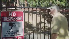 A fence in small East Bay community dividing neighbors