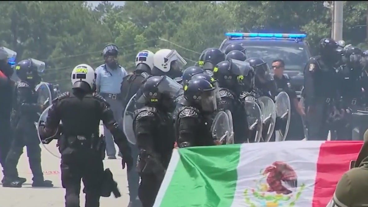 Tear gas used to keep protesters off highway