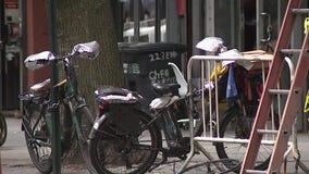 14th Street sidewalk crowded with bikes