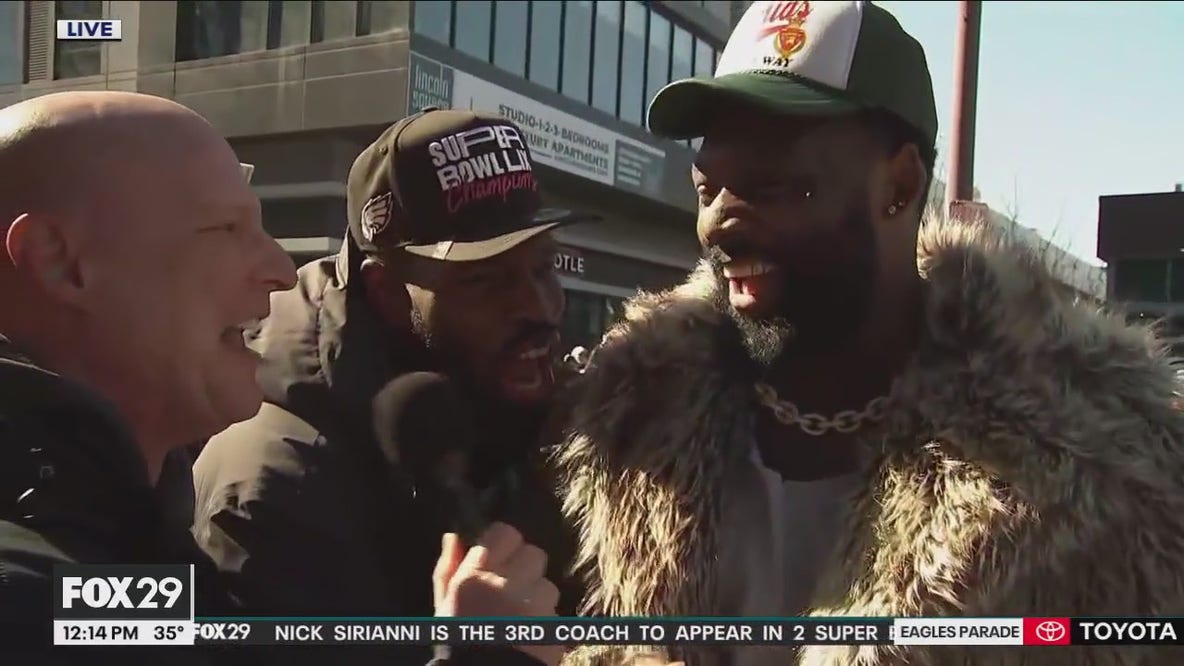 Josh Sweat rocks Chris Long's fur coat from Super Bowl LII parade