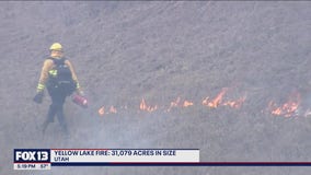 Crews continue to battle western wildfires