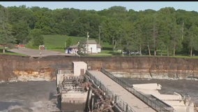 Rapidan Dam: Home falls into Blue Earth River