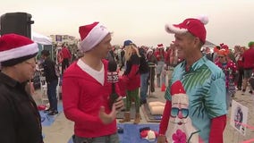 Surfing Santas in Cocoa Beach