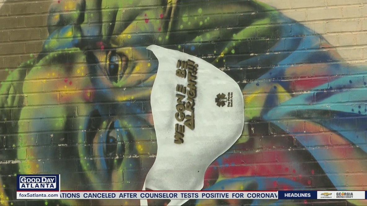 Murals encouraging face coverings
