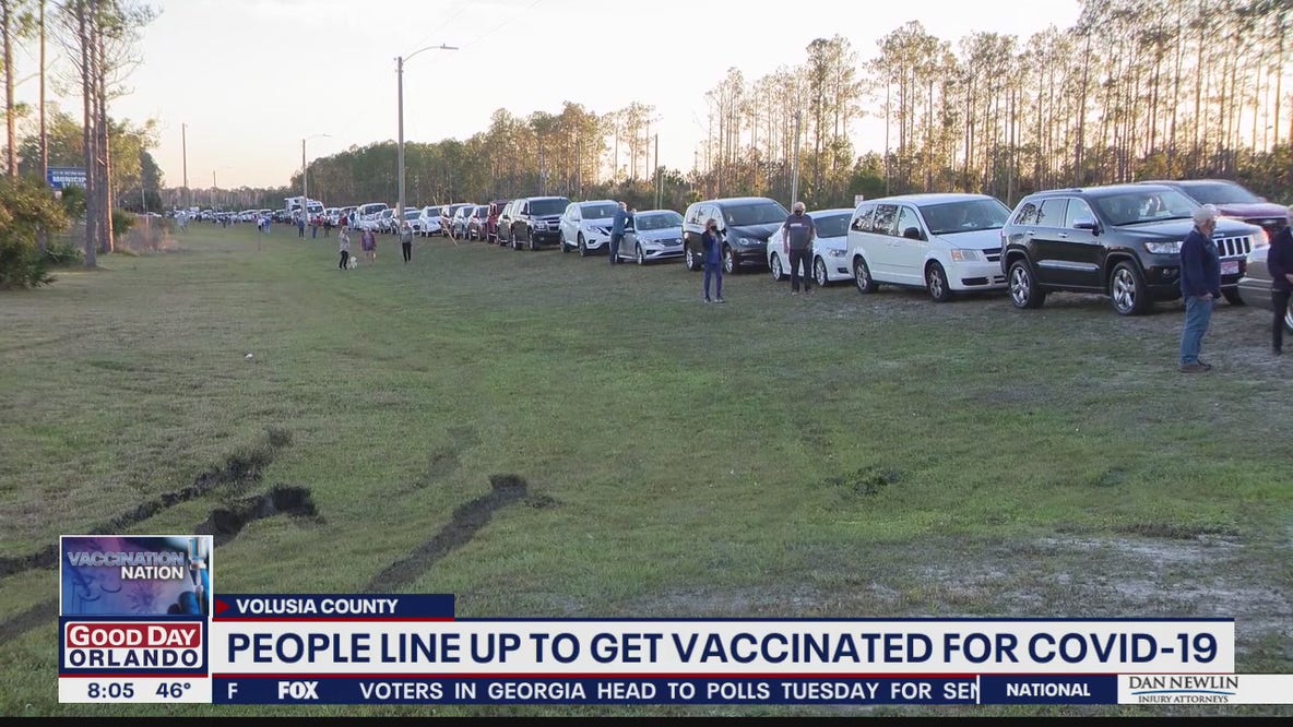 Hundreds camp out inside Daytona Stadium to receive COVID-19 vaccine