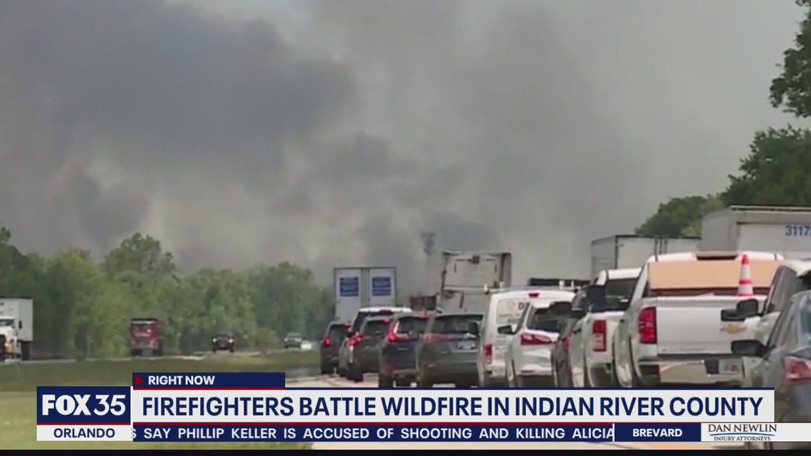 Firefighters battle massive wild fire in Indian River County