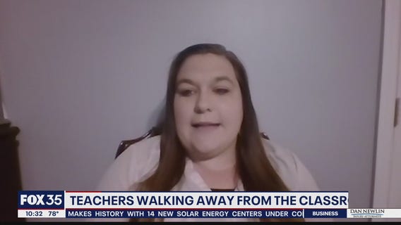 Teachers walking away from classroom