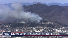 South San Francisco hillside sign fire contained, evacuations remain in place
