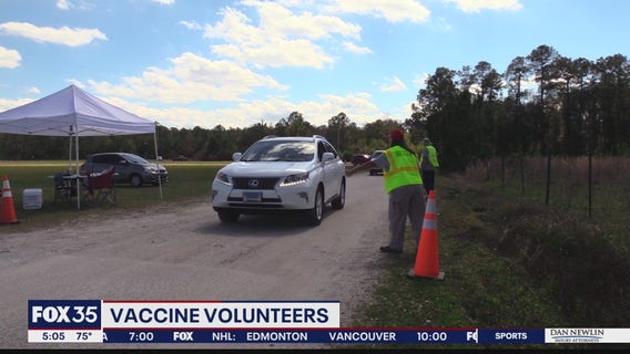 Veterans volunteer at vaccine site