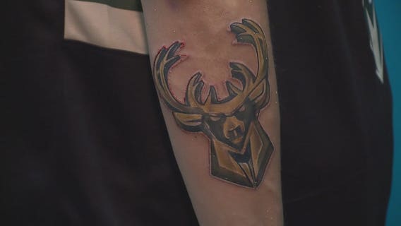 Fans celebrate Bucks' championship win with tattoos