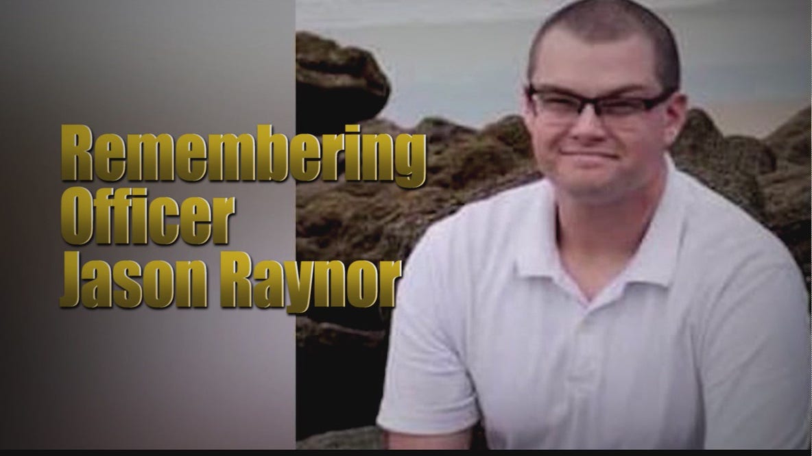 Community remembers fallen Officer Jason Raynor