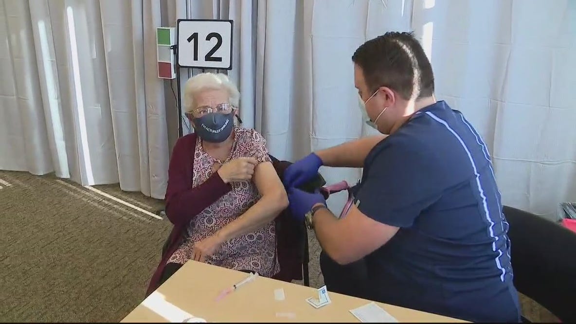 Beaumont nurse gives COVID-19 vaccine to his grandmother
