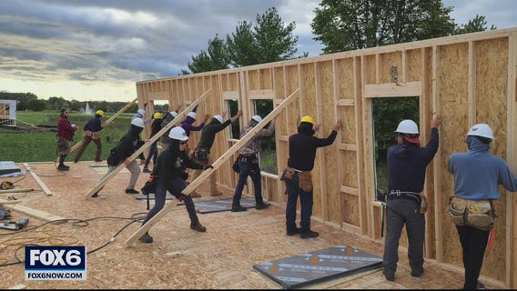Franklin High School students help build home