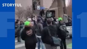 Protesters surround semi-truck after it drives near Minneapolis crowd after Chauvin verdict