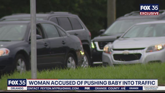 Woman accused of pushing baby into traffic