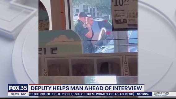 Seminole County deputy helps young man with tie ahead of interview