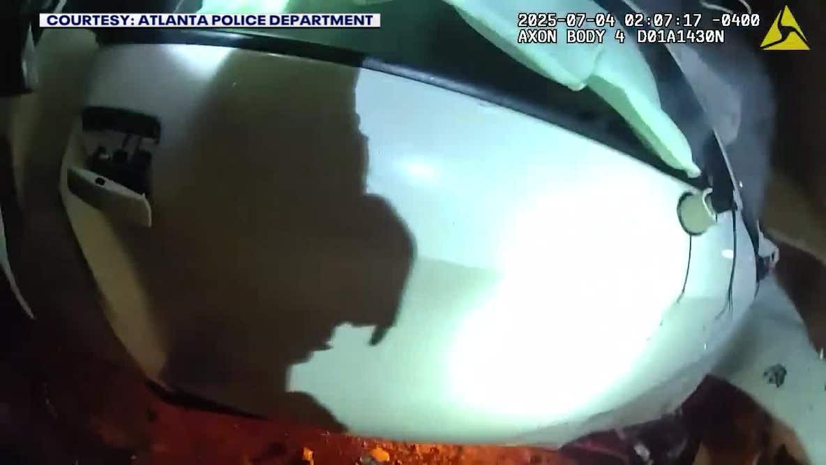 Atlanta police officers rescue passenger from burning car