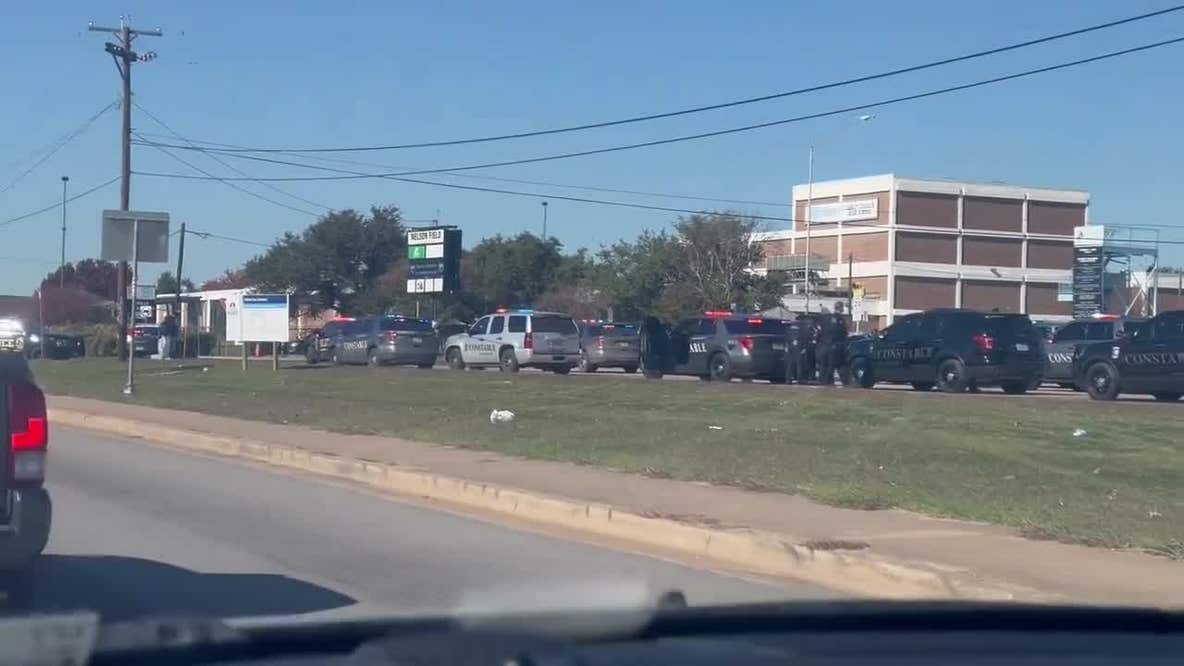 Video: School on lockdown after officer shot