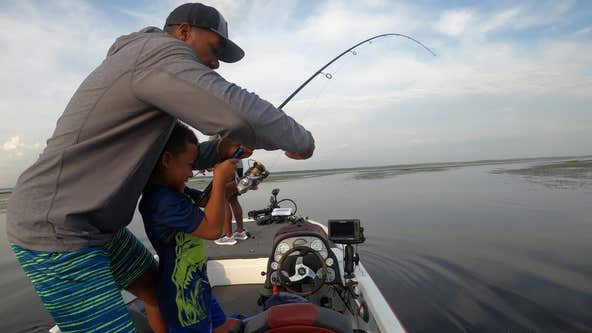 Viral video captures 6-year-old catching 8lb fish while his father erupts  with pride and