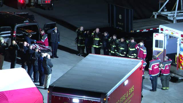 DC plane crash: Flag draped remains honored by first responders