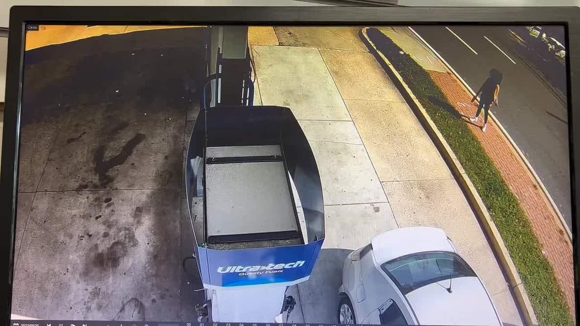 Car narrowly misses woman before crashing into gas station in Laurel