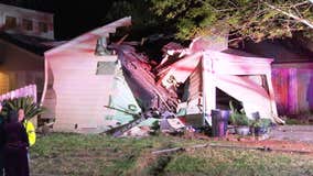 Car crashes into garage of home in Cypress