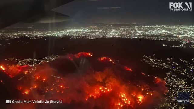 California wildfires: Plane passenger films aerial view of Palisades Fire