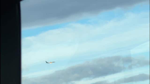 FedEx plane seen flying while on fire near Newark Airport