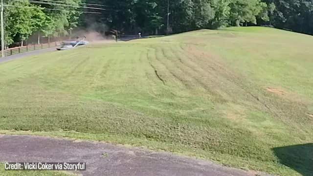 Watch: Small plane flips over in South Carolina yard after pilot's maneuver