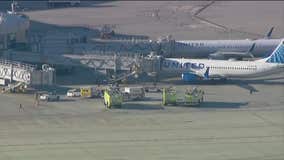 United flight makes emergency landing after battery catches on fire