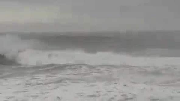 Surfers take advantage of big waves in Santa Cruz