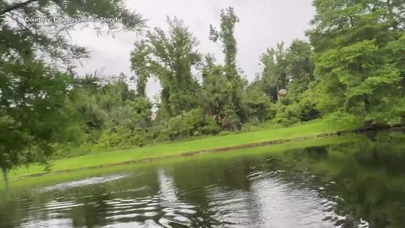 Florida gator caught on camera popping out of pond, charging at fisherman: 'That's my foot!'