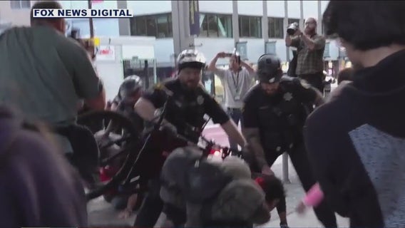 Arrests made at protests outside Turning Point USA event