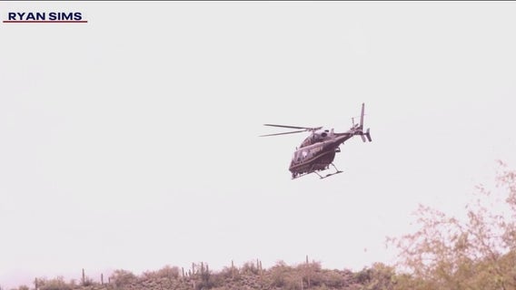 Search continues for missing man swept away in floodwaters