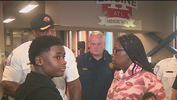 Cousins reunite with firefighters who saved them from stalled elevator
