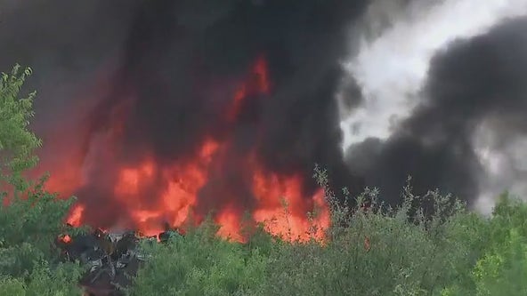 Large trash fire set unintentionally