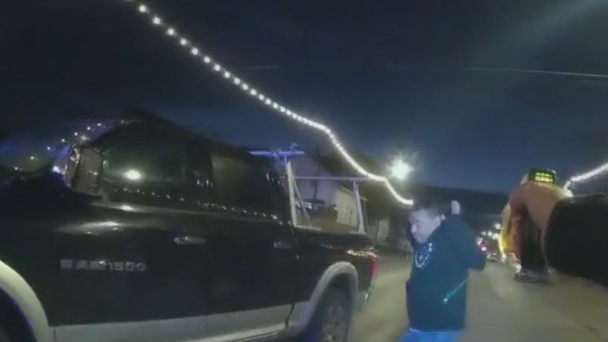 Truck crashes into squad, man charged with OWI