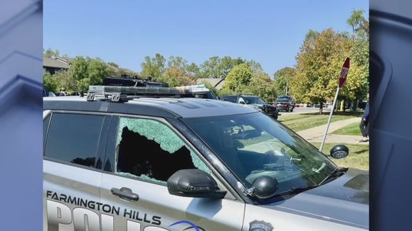 Suspect shot by police after firing multiple rounds, hitting cars, houses in Farmington Hills