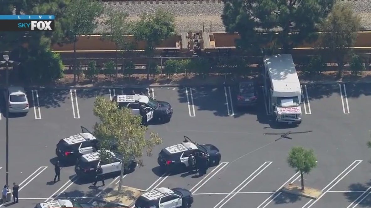 Pursuit suspect barricaded in Costco parking lot