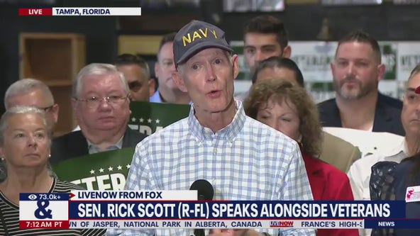 Sen. Rick Scott (R-FL) speaks alongside veterans