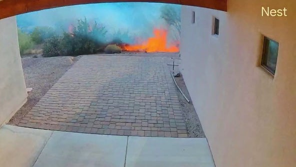 Video captures flames threatening AZ homes