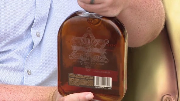 Liquor store honors Deputy Brad Reckling with custom bourbon bottles