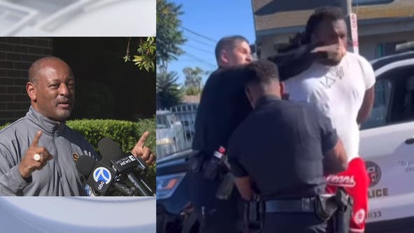 LAPD cop punches man in handcuffs