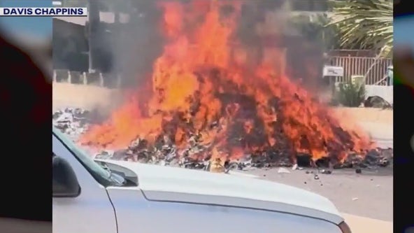 Phoenix garbage truck dumps load due to trash fire