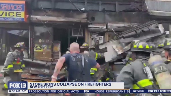 Store signs collapse on New York City Firefighters