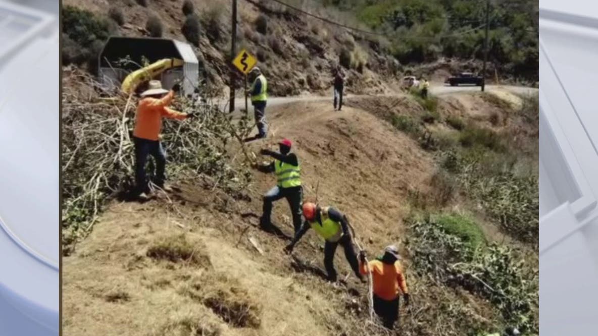 Crews working to prevent another massive wildfire