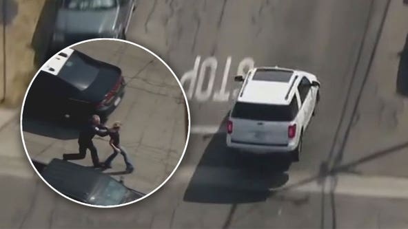 Pursuit car goes airborne, driver makes a run for it