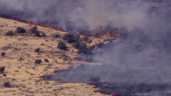 Point Fire burning northeast of New River