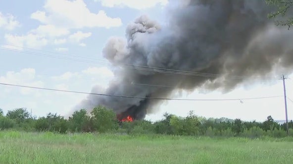 Large trash fire put out at recycling facility