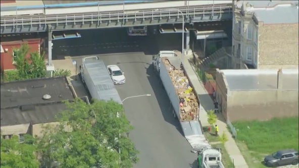 UPS truck looted after roof peeled off during crash